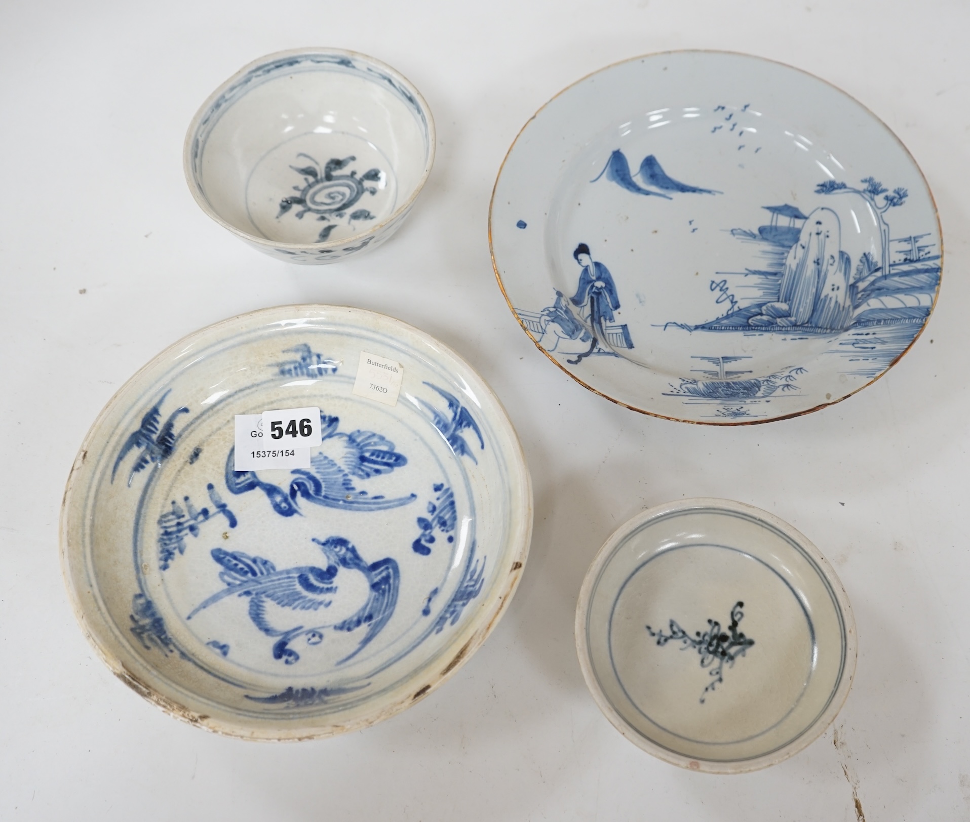 Three 15th century pieces from the Saga Visal Hoi-an hoard Vietnamese shipwreck and a delft dish, 26cm. Condition - commensurate with age